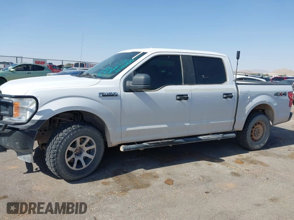 2018 Ford F-150 XL with VIN 1FTEW1E53JKE93841, listed as a IAAI auction lot 42256829 with 126,192 mi miles and . Bid and sale history available at DreamBid. Image 14.