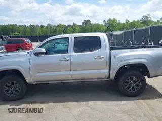 2023 Toyota Tacoma SR with VIN 3TYCZ5AN4PT149730, listed as a IAAI auction lot 42083146 with 31,731 mi miles and . Bid and sale history available at DreamBid. Image 14.