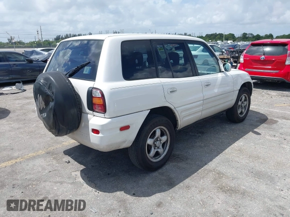1999 Toyota RAV4 with VIN JT3GP10V5X7043735, listed as a IAAI auction lot 41939137 with 206,044 mi miles and . Bid and sale history available at DreamBid. Image 4.