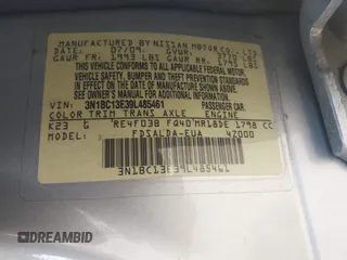 2009 Nissan Versa S z VIN 3N1BC13E39L485461, wystawiony jako IAAI lot #39886048 z przebiegiem Nie podano mil oraz . Historia ofert i sprzedaży dostępna na DreamBid. Obrazek 9.