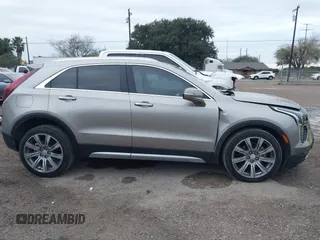 2022 Cadillac XT4 FWD Premium Luxury with VIN 1GYFZCR45NF164754, listed as a IAAI auction lot 41278705 with 65,698 mi miles. Bid and sale history available at carsss.com. Image 13.