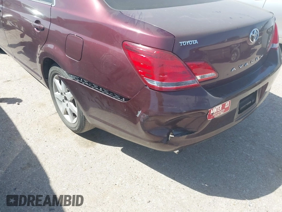 2007 Toyota Avalon XL z VIN 4T1BK36B97U205988, wystawiony jako IAAI lot #41738847 z przebiegiem 99 951 mil mil oraz . Historia ofert i sprzedaży dostępna na DreamBid. Obrazek 6.