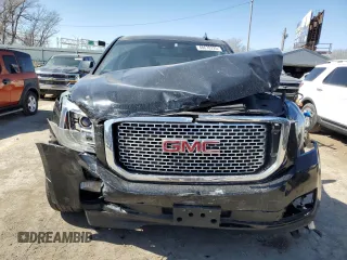 2017 GMC Yukon Denali with VIN 1GKS2CKJXHR389946, listed as a Copart auction lot 48678225 with 156,603 mi miles and Salvage Title. Bid and sale history available at carsss.com. Image 5.