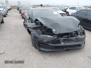 2022 Tesla Model S Plaid with VIN 5YJSA1E65NF484149, listed as a IAAI auction lot 40937538 with 11,459 mi miles and . Bid and sale history available at DreamBid. Image 1.