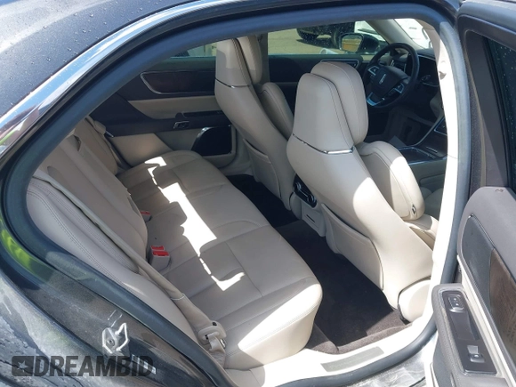 2017 Lincoln Continental Reserve z VIN 1LN6L9RP0H5636532, wystawiony jako IAAI lot #41882280 z przebiegiem 98 733 mil mil oraz . Historia ofert i sprzedaży dostępna na DreamBid. Obrazek 8.