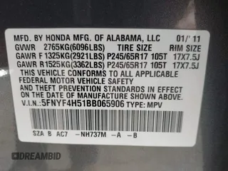 2011 Honda Pilot EX-L with VIN 5FNYF4H51BB065906, listed as a IAAI auction lot 41956370 with 233,977 mi miles and . Bid and sale history available at DreamBid. Image 9.