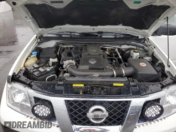 2018 Nissan Frontier SV with VIN 1N6AD0EV5JN744725, listed as a Copart auction lot 57601215 with 61,718 mi miles and Salvage title. Bid and sale history available at DreamBid. Image 11.
