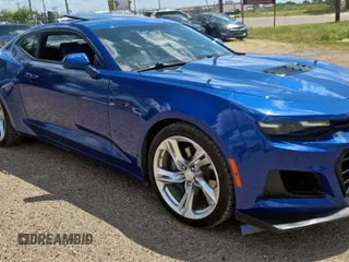 2021 Chevrolet Camaro LT1 с VIN 1G1FF1R77M0104174, выставлен на аукционе Copart как лот 60335235 с пробегом 38 595 миль миль и Списание • Salvage title. История ставок и продаж доступна на DreamBid. Изображение 1.