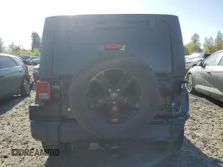 2016 Jeep Wrangler Unlimited Sport z VIN 1C4BJWDG5GL134169, wystawiony jako Copart lot #53517145 z przebiegiem 129 824 mil mil oraz Szkoda całkowita • Salvage title. Historia ofert i sprzedaży dostępna na DreamBid. Obrazek 6.
