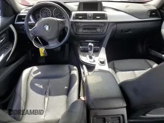 2013 BMW 3 Series 328i xDrive with VIN WBA3B3C5XDJ810958, listed as a Copart auction lot 60620005 with 143,589 mi miles and Salvage title. Bid and sale history available at DreamBid. Image 8.