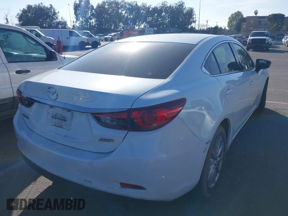 2015 Mazda 6 i Sport with VIN JM1GJ1U59F1211787, listed as a IAAI auction lot 41645517 with 83,537 mi miles. Bid and sale history available at carsss.com. Image 4.