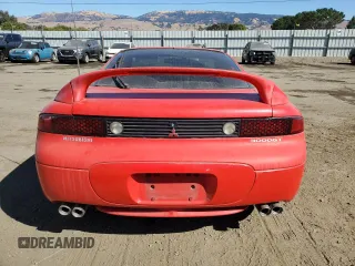 1999 Mitsubishi 3000GT z VIN JA3AM44H2XY001614, wystawiony jako Copart lot #77580444 z przebiegiem 128 948 mil mil oraz Tytuł czysty. Historia ofert i sprzedaży dostępna na DreamBid. Obrazek 6.