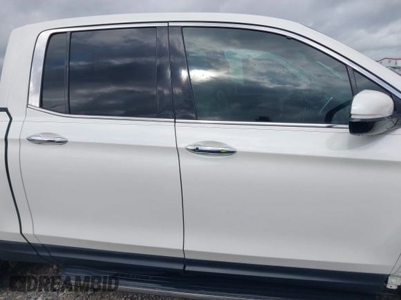 2019 Honda Ridgeline RTL-E with VIN 5FPYK3F78KB018356, listed as a IAAI auction lot 41946363 with 61,472 mi miles and . Bid and sale history available at DreamBid. Image 14.