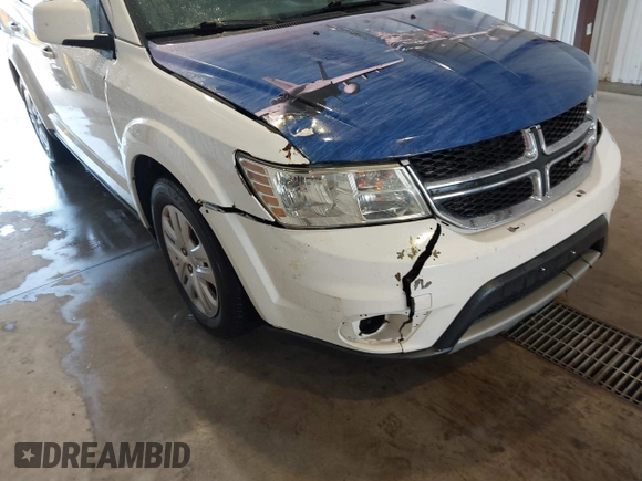 2019 Dodge Journey SE with VIN 3C4PDCBBXKT835029, listed as a IAAI auction lot 42120482 with 130,282 mi miles and . Bid and sale history available at DreamBid. Image 6.