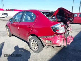 2013 Suzuki SX4 LE with VIN JS2YC5A34D6100952, listed as a IAAI auction lot 41184344 with 1 mi miles. Bid and sale history available at carsss.com. Image 3.