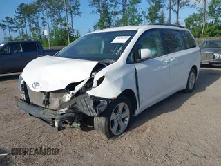 2014 Toyota Sienna LE AAS with VIN 5TDKK3DCXES457492, listed as a IAAI auction lot 41954203 with 226,355 mi miles. Bid and sale history available at carsss.com. Image 2.