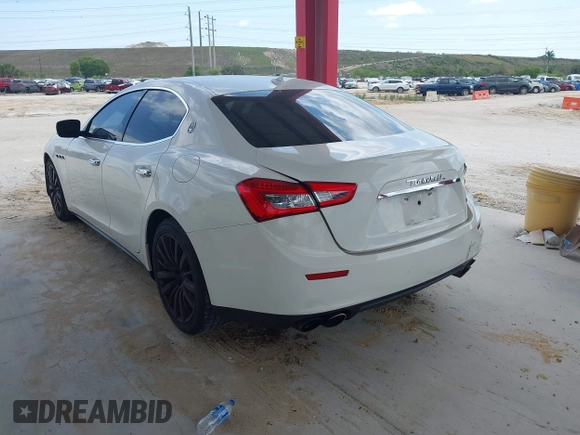 2016 Maserati Ghibli S with VIN ZAM57RSA3G1171238, listed as a IAAI auction lot 42290180 with 117,738 mi miles and . Bid and sale history available at DreamBid. Image 3.