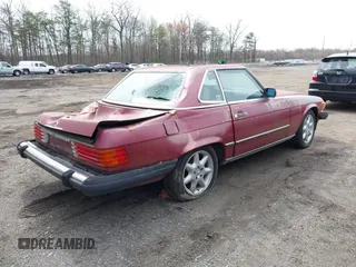 1989 Mercedes-Benz 560 with VIN WDBBA48D8KA098792, listed as a IAAI auction lot 41929891 with 160,351 mi miles. Bid and sale history available at carsss.com. Image 4.