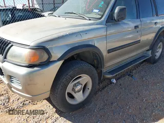 2000 Mitsubishi Montero LS z VIN JA4MT31HXYP020087, wystawiony jako IAAI lot #41540609 z przebiegiem 262 474 mil mil oraz . Historia ofert i sprzedaży dostępna na DreamBid. Obrazek 6.