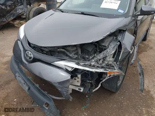 2020 Toyota C-HR LE with VIN JTNKHMBX0L1073916, listed as a IAAI auction lot 41720784 with 96,730 mi miles. Bid and sale history available at carsss.com. Image 6.