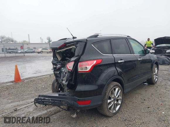 2014 Ford Escape SE z VIN 1FMCU9G94EUD64427, wystawiony jako IAAI lot #41965103 z przebiegiem 66 429 mil mil oraz . Historia ofert i sprzedaży dostępna na DreamBid. Obrazek 4.