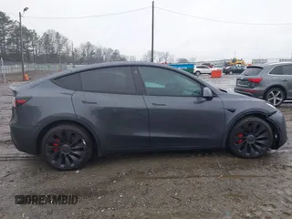 2022 Tesla Model Y Performance with VIN 7SAYGDEF1NF379167, listed as a IAAI auction lot 41429842 with 86,582 mi miles and . Bid and sale history available at DreamBid. Image 14.