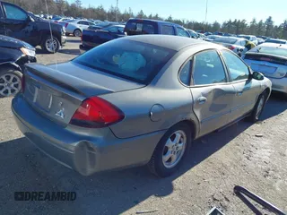 2004 Ford Taurus SE with VIN 1FAFP53224G197451, listed as a IAAI auction lot 41224109 with 290,224 mi miles and . Bid and sale history available at DreamBid. Image 4.
