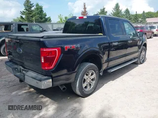 2021 Ford F-150 XL z VIN 1FTFW1E5XMFA57179, wystawiony jako IAAI lot #42561205 z przebiegiem 90 517 mil mil oraz . Historia ofert i sprzedaży dostępna na DreamBid. Obrazek 4.