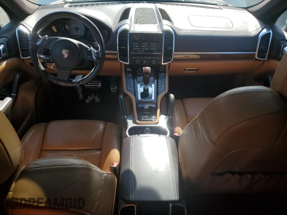 2012 Porsche Cayenne S Hybrid with VIN WP1AE2A25CLA90443, listed as a Copart auction lot 60108595 with 141,595 mi miles and Clean title. Bid and sale history available at DreamBid. Image 8.