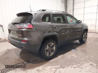 2019 Jeep Cherokee Trailhawk Elite with VIN 1C4PJMBX8KD298807, listed as a IAAI auction lot 41107062 with 79,685 mi miles. Bid and sale history available at carsss.com. Image 4.