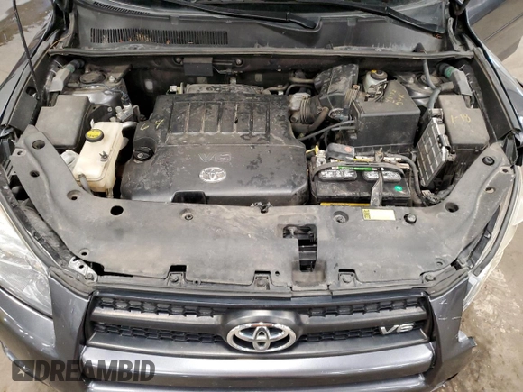 2010 Toyota RAV4 Sport with VIN JTMRK4DV8A5085818, listed as a Copart auction lot 51799295 with 115,109 mi miles and Salvage title. Bid and sale history available at DreamBid. Image 12.
