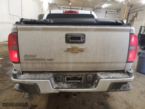 2020 Chevrolet Colorado 4WD Work Truck with VIN 1GCGTBENXL1242427, listed as a Copart auction lot 46434505 with 63,453 mi miles and Salvage Title. Bid and sale history available at carsss.com. Image 6.