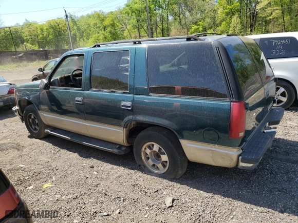 1999 Chevrolet Tahoe with VIN 1GNEC13R2XJ536828, listed as a Copart auction lot 53610465 with 201,276 mi miles and Salvage Title. Bid and sale history available at carsss.com. Image 2.