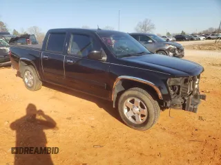 2012 GMC Canyon SLE1 with VIN 1GTD5MF90C8133699, listed as a Copart auction lot 42194595 with 111,141 mi miles and Salvage Title. Bid and sale history available at carsss.com. Image 4.