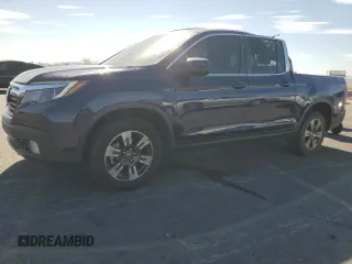 2019 Honda Ridgeline RTL-T with VIN 5FPYK3F63KB016912, listed as a Copart auction lot 63827065 with 79,509 mi miles and Salvage title. Bid and sale history available at DreamBid. Image 1.
