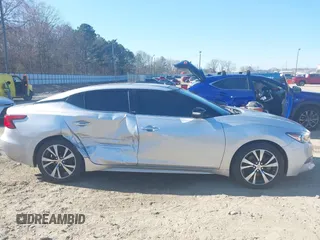 2016 Nissan Maxima SL with VIN 1N4AA6AP6GC448161, listed as a IAAI auction lot 41709077 with 133,288 mi miles and . Bid and sale history available at DreamBid. Image 13.