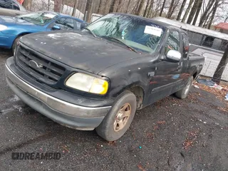 2002 Ford F-150 XL with VIN 1FTRX17252NA19861, listed as a IAAI auction lot 41304648 with 279,277 mi miles. Bid and sale history available at carsss.com. Image 2.