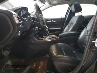 2018 Infiniti QX30 Essential z VIN SJKCH5CR7JA057432, wystawiony jako Copart lot #57773095 z przebiegiem 94 839 mil mil oraz Tytuł czysty. Historia ofert i sprzedaży dostępna na DreamBid. Obrazek 7.