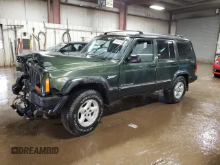 1998 Jeep Cherokee Sport with VIN 1J4FJ68S3WL146331, listed as a Copart auction lot 49420995 with 200,040 mi miles and Salvage Title. Bid and sale history available at carsss.com. Image 1.