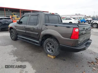 2005 Ford Explorer Sport Trac XLS z VIN 1FMZU77K05UB13891, wystawiony jako IAAI lot #40859877 z przebiegiem 157 308 mil mil oraz . Historia ofert i sprzedaży dostępna na DreamBid. Obrazek 3.