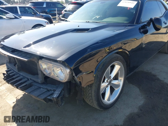 2014 Dodge Challenger R/T z VIN 2C3CDYBT2EH313789, wystawiony jako IAAI lot #42020945 z przebiegiem 182 788 mil mil oraz . Historia ofert i sprzedaży dostępna na DreamBid. Obrazek 6.
