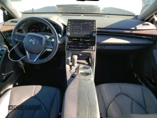 2022 Toyota Avalon XLE z VIN 4T1AZ1FB4NU085980, wystawiony jako Copart lot #47639985 z przebiegiem 15 154 mil mil oraz Szkoda całkowita • Salvage title. Historia ofert i sprzedaży dostępna na DreamBid. Obrazek 8.