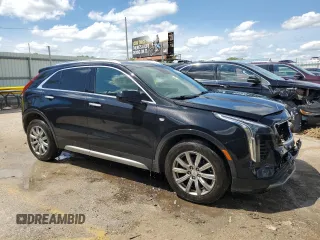 2020 Cadillac XT4 AWD Premium Luxury with VIN 1GYFZDR47LF088070, listed as a Copart auction lot 42802985 with 102,777 mi miles and Salvage Title. Bid and sale history available at carsss.com. Image 4.