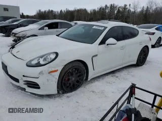 2015 Porsche Panamera 4S z VIN WP0AB2A78FL051095, wystawiony jako Copart lot #76769204 z przebiegiem 82 926 mil mil oraz Szkoda całkowita • Salvage title. Historia ofert i sprzedaży dostępna na DreamBid. Obrazek 1.