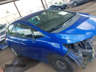 2015 Honda Fit LX z VIN 3HGGK5H51FM711607, wystawiony jako IAAI lot #42249495 z przebiegiem Nie podano mil oraz . Historia ofert i sprzedaży dostępna na DreamBid. Obrazek 14.
