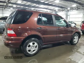 2002 Mercedes-Benz M-Class with VIN 4JGAB75E72A323840, listed as a Copart auction lot 75729384 with 122,811 mi miles and Salvage Title. Bid and sale history available at carsss.com. Image 3.