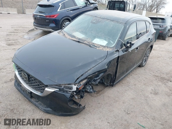 2023 Mazda CX-5 S Premium with VIN JM3KFBDM2P0221973, listed as a IAAI auction lot 41853756 with Not Provided miles and . Bid and sale history available at DreamBid. Image 6.