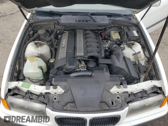 1997 BMW 3 Series 328is with VIN WBABG132XVET04869, listed as a Copart auction lot 45774015 with 123,280 mi miles and Salvage Title. Bid and sale history available at carsss.com. Image 11.
