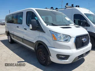 2021 Ford Transit Passenger XL with VIN 1FBAX2Y82MKA31674, listed as a IAAI auction lot 41973622 with 103,987 mi miles. Bid and sale history available at carsss.com. Image 1.