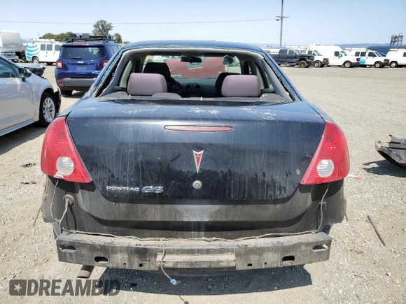 2006 Pontiac G6 1SV z VIN 1G2ZF55BX64225352, wystawiony jako Copart lot #57915805 z przebiegiem 194 400 mil mil oraz Szkoda całkowita • Salvage title. Historia ofert i sprzedaży dostępna na DreamBid. Obrazek 6.